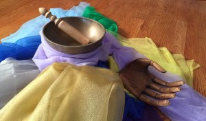 scarves, bowl and wooden hand - mercury retrograde - action institute of california - action insights blog by Jean Campbell