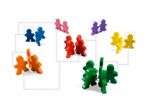 Business concepts illustrated with colorful wooden people - networking, organizational groups, or workgroups. - got cleavage? - Action Institute - Jean Campbell