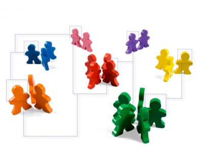 Business concepts illustrated with colorful wooden people - networking, organizational groups, or workgroups. - got cleavage? - Action Institute - Jean Campbell