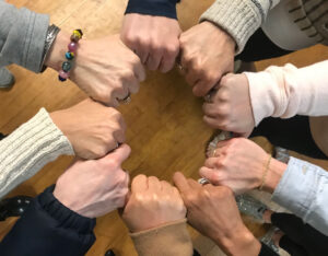 hands together in a circle - The Action Institute of California - Using Action to Effect Change - Psychodrama Bodywork - Online CE Courses
