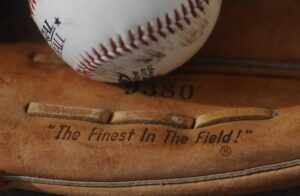 baseball glove and baseball